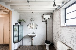 Decorated with distinctive vintage and contemporary pieces, this bathroom has loads of individuality.
