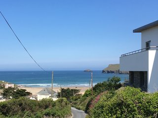 The house has uninterrupted views over the village of Polzeath and its sandy beach and bay, which is a surfing hotspot.
