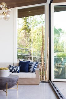 Brass accents brighten up the multifunctional space.