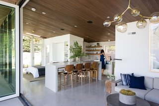 Clean, simple colors allow wood tones to glow, tying back to the outdoor environment.