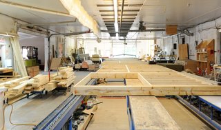 Panels for the prefab house were manufactured out of laminated strand lumber (LSL), an engineered wood product made from scrap wood. Designed for weather resistance, it's stronger than traditional framing materials and less likely to warp or split. 