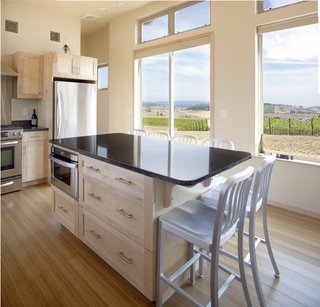 IdeaBox expertly makes small spaces seem much larger with seamless views of the outdoors, 8-foot ceilings, tall windows, and light, airy interiors. These features make the FUSE series a popular option for modular homes under $200K.