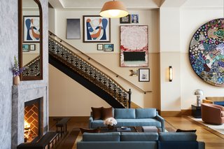 Awash in blue, the prominent "living room" is not just a social hangout for Shinola Hotel guests, but the downtown Detroit community.