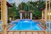 Modern home with Exterior and House Building Type. Pool Photo 19 of Spice Bay