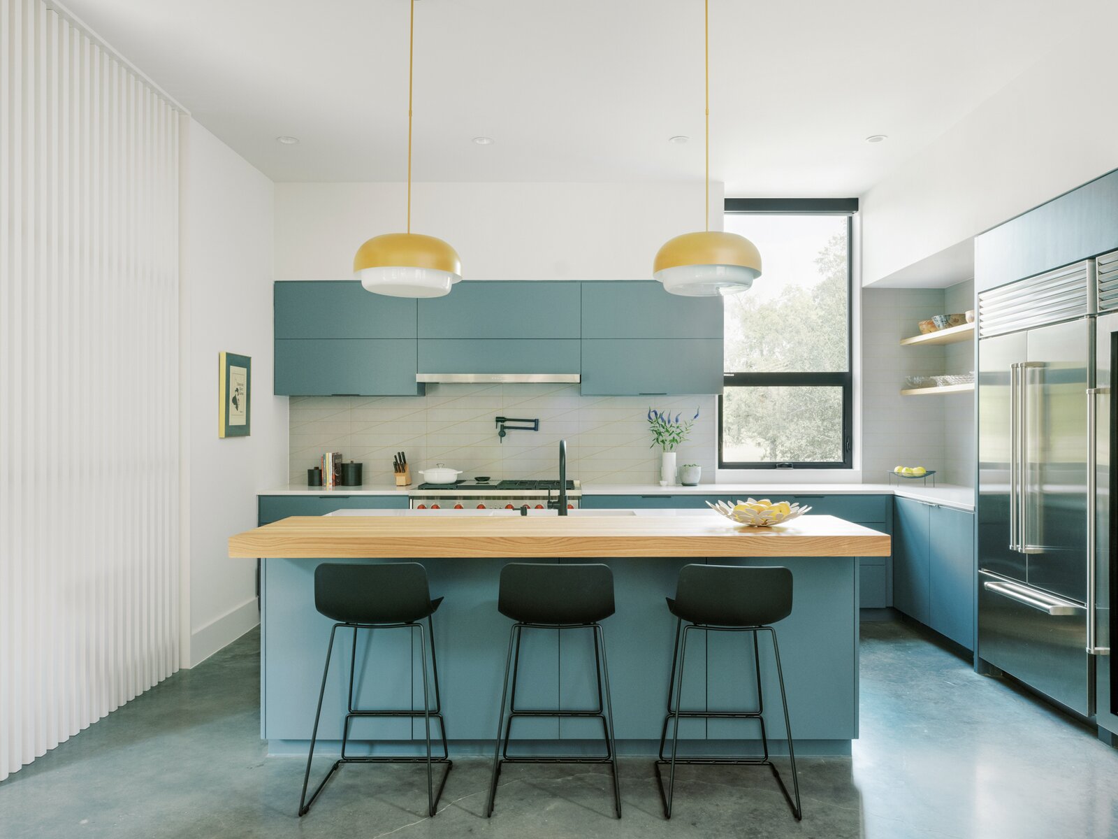 Photo 9 of 15 in Tile, Texas Stone, and Concrete Rule in This Soaring