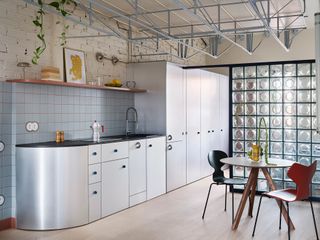 The Loft in This Madrid Flat Hangs From the Ceiling With a Metal Truss