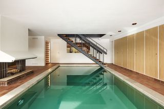 Of Course the Kitchen Matches the Indoor Pool at This Swedish Villa