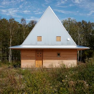 This 605-Square-Foot Swedish Cabin Looks Like It’s Wearing a Witch’s Hat