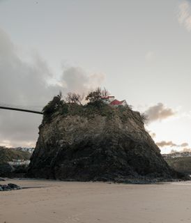 A Famous Cornwall Cottage Only Accessible by Footbridge Just Doubled in Size—But You’d Never Know It