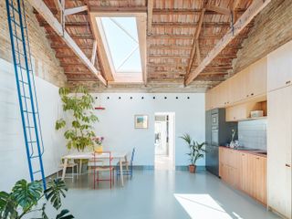 Knocking Out Partitions and a Drop Ceiling Loft-ified This ’60s Spanish Home