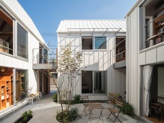 In Tokyo, Four Volumes Form a Miniature "Village" Where a Family Writes, Draws, and Plays Music