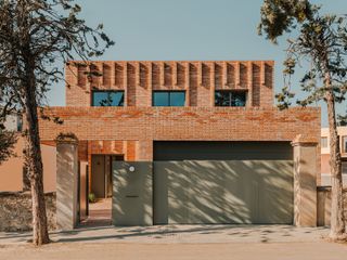 Flexibility Is at the Forefront of This Brick Home in Barcelona
