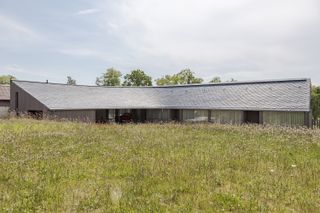 On the Latvian Coast, a Sea-Inspired Twist on the Gable Home