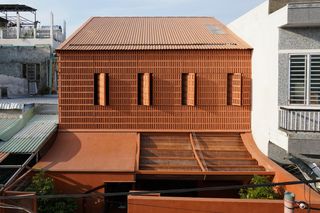 Tons of Terra-Cotta Make Up This Multigenerational Vietnamese Home