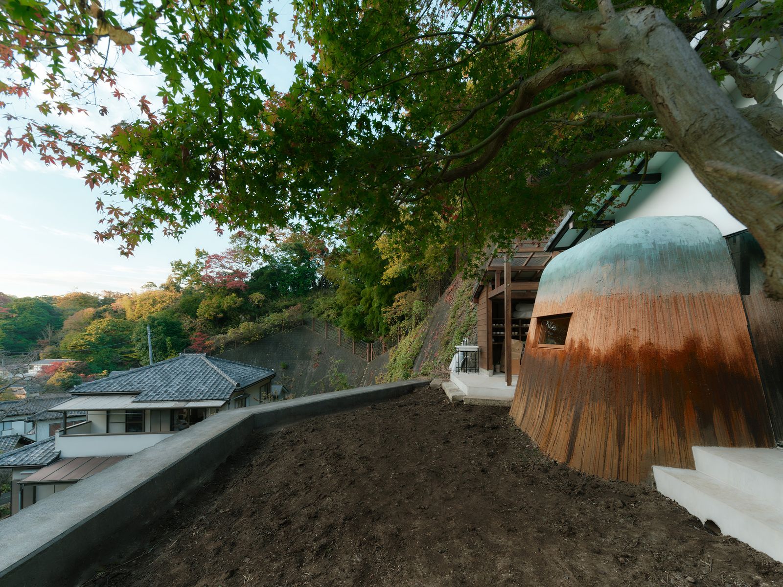 Photo 4 of 12 in The Clay Domes Anchoring This Japanese Home Are ...
