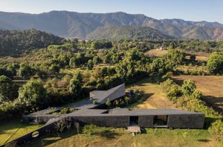 Pools Line the Entrance to This Monolithic Home in Valle de Bravo