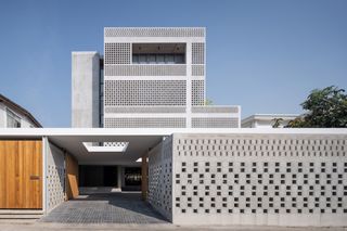 You Couldn’t Begin to Count the Perforations in the Facade of This Bangkok Home