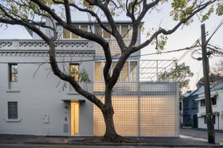 It Was a Pub, Then a Grocery Store. Now It’s a Home With a Three-Level Glass Block Addition