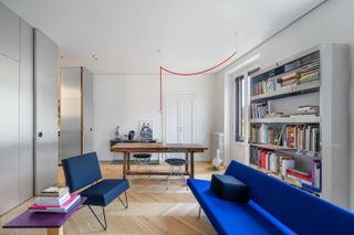You Enter This Historic 860-Square-Foot Milan Apartment Through a New Metal Portal
