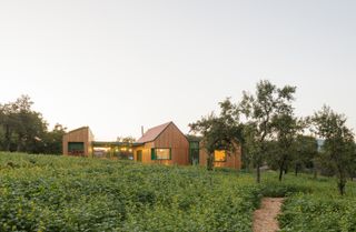 This Crisp Cluster of Gables in Transylvania Started With Prefab Modules