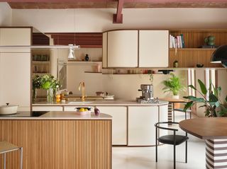 A Wavy Wardrobe Echoes Original Barrel Vaulted Ceilings in This Renovated Barcelona Flat