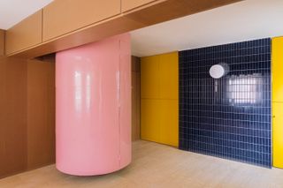A Pink Stair Punctuates a Family’s Renovated 720-Square-Foot Madrid Apartment