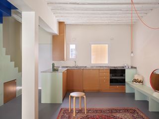 The Yellow Steel Prop in This Stripped-Back Madrid Townhome Made Us Do a Double Take
