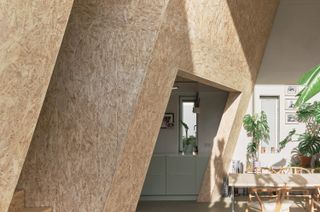 In Germany, a Home’s Tiny Windows Conceal a Mammoth Wooden Core