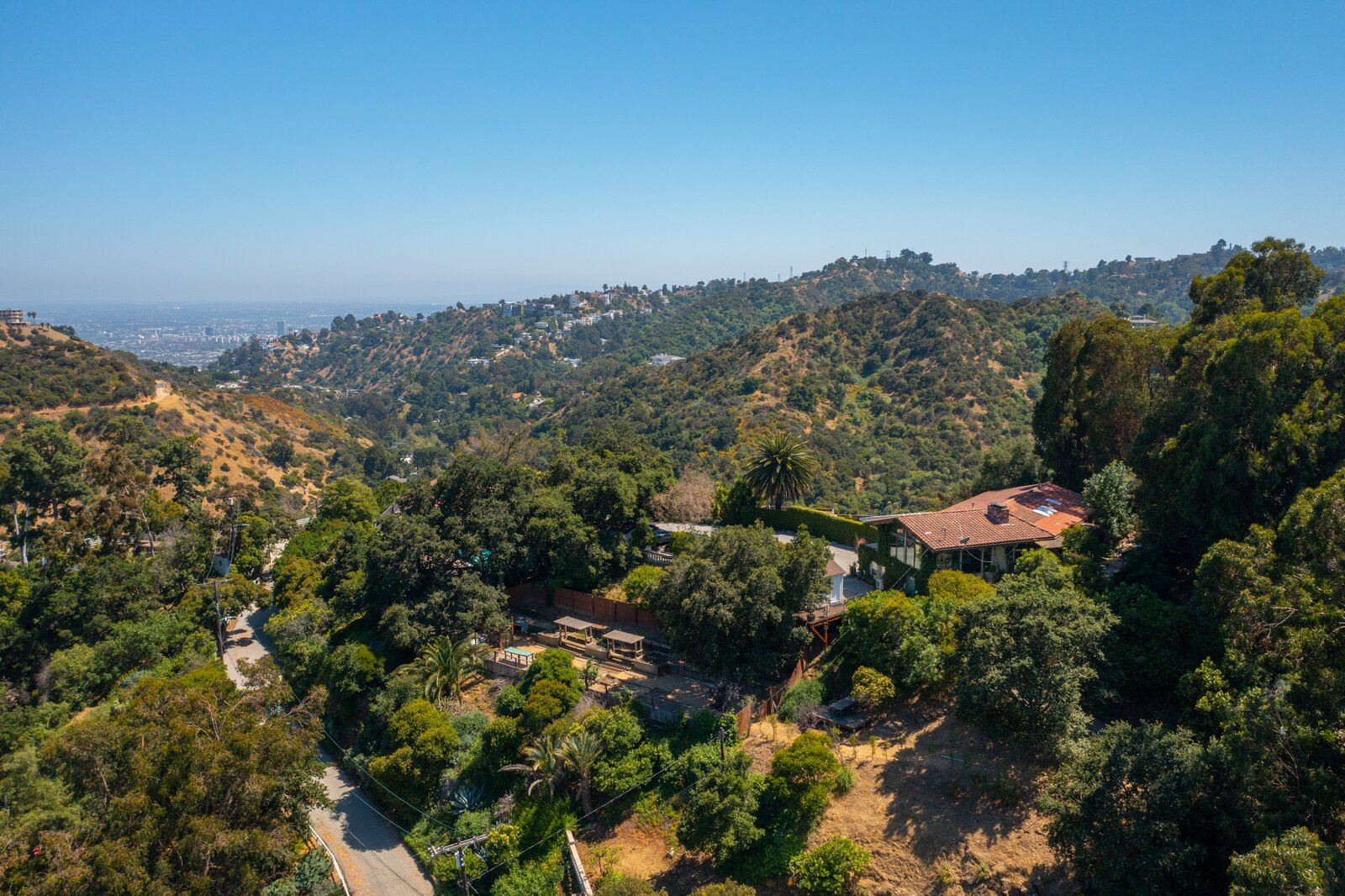 Photo 16 of 16 in Rare 3.4 Acre Lot With Three Built Homes on Mulholland Drive Lists for 17.9M