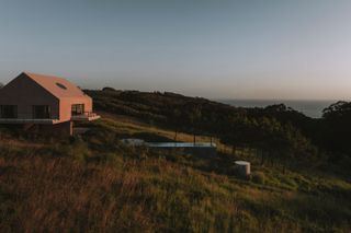 Every Side of This Pink House in Portugal Has a Patio